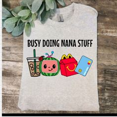 a t - shirt with the words busy doing nanna stuff on it