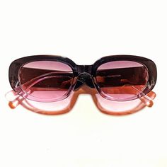 These retro groovy 1970s vintage style sunglasses feature an Cateye lens and provide UV 400 protection. Dimensions: Length: 6 inches Lens: 2 x 3 inches Retro Pink Cat Eye Sunglasses With Tinted Lenses, Retro Glass Sunglasses With Tinted Lenses, Retro Pink Polarized Cat Eye Sunglasses, Retro Plastic Cat Eye Sunglasses With Uv Protection, Retro Pink Cat Eye Sunglasses With Polarized Lenses, Retro Sunglasses With Gradient Glass Lenses, Retro Purple Sunglasses With Tinted Lenses, Retro Glass Cat Eye Sunglasses For The Beach, Retro Sunglasses With Uva Protection For Party