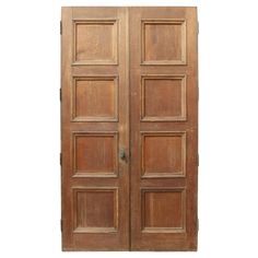 an old wooden double door on a white background