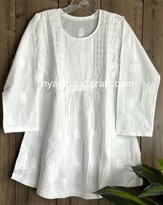 Pure cotton Chikankari hand embroidered a line blouse. Length: 30 inches Chikankari Tops, White Tunic Blouse, Cream Blouse, Short A, Unique Blouse Designs, Aesthetic Fits, Unique Blouse, White Tunic, Idea Board