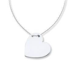 Simply captivating, this contemporary necklace for her features a heart of 14K white gold, threaded through the top with an adjustable 16- to 18-inch cable chain. The necklace secures with a lobster clasp. Modern Sterling Silver Heart Pendant Necklace, Modern Sterling Silver Heart Necklace, Modern Heart-shaped Sterling Silver Necklace, Modern Necklaces For Anniversary On Valentine's Day, Modern Heart Charm Necklace As Gift, Modern Necklaces For Valentine's Day Anniversary, Modern Heart Charm Necklace Gift, Modern Heart Pendant Necklace For Gift, Modern Heart Pendant Necklace Gift