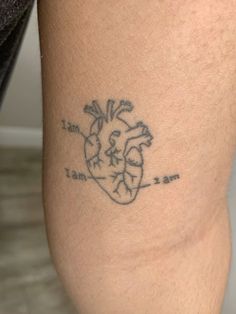 a person with a tattoo on their arm