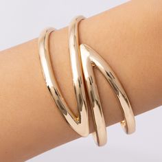 Attached layers, includes everything pictured Material: gold plated brass Diameter: 2.25" IMPORTED Gold Bracelet Jewelry For Spring, Gold Spring Bracelet, Spring Gold Bracelet Jewelry, Gold Bangle Bracelets For Spring, Modern Gold Bracelets For Spring, Gold Bangle Bracelet For Spring, Trendy Gold Bangle For Spring, Spring Gold Trendy Bangle, Gold Cuff Bracelets For Spring