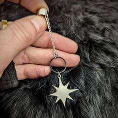 Named after the Chinese goddess of the North star, Add some extra bling to your ears with our DOUMU STAR dangle earcuffs. This ear cuff is quite flexible and will comfortably fits over the middle and top of most people's ears. No piercing is required to wear this earcuff. 🌑Production Time: Each piece of hair adornment is a handcrafted and unique piece that is made to order. Please allow 2-4 business days for production. If you have a specific deadline, please let me know and I will do my best a Celestial Star Cartilage Earring, Silver Star-shaped Ear Cuff As Gift, Silver Star-shaped Ear Cuff For Gift, Silver Star Shaped Ear Cuff As Gift, Silver Star Shaped Ear Cuff Gift, Chinese Goddess, The North Star, Fingernail Polish, Silver Cleaner