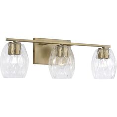 This 3 light Vanity Light from the Lucas collection by Capital Lighting will enhance your home with a perfect mix of form and function. The features include a Aged Brass finish applied by experts.   Product Features Include: Brand: Capital Lighting  Collection: Lucas  SKU: 145331AD-525  UPC: 841740164436  Category: Bathroom Vanity Light  Finish: Aged Brass  Glass: Wavy Embossed  Material: Metal/Glass  Width: 24.00  in.  Height: 7.75  in.  Extension/Depth: 6.50  in.  Backplate/Canopy Width: 8.00 Vanity Light Bulbs, Brass Vanity Light, Capital Lighting Fixture, Capital Lighting, Glass Vanity, Bath Vanity Lighting, Wall Light Fixtures, Bathroom Vanity Lighting, Aged Brass