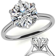 a diamond engagement ring with the center stone on it's side and an additional band