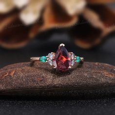 Vintage Garnet Engagement Ring Unique Red Gemstone Ring | Etsy Red Pear-shaped Jewelry With Center Stone, Red Multi-stone Birthstone Ring, Burgundy Gemstone Wedding Rings, Burgundy Gemstone Ring, Red Birthstone Ring With Gemstone Accents For Promise, Red Multi-stone Gemstones For Gift, Red Stone Rings For Anniversary, Red Garnet Multi-stone Jewelry, Fine Jewelry Red Multi-stone Gemstones