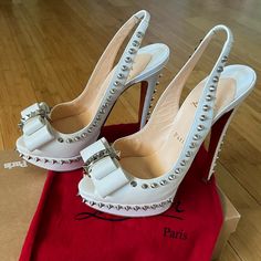 Christian Louboutin Lady Clou Spiked Platform Slingback Heelssize 38.5/ 8.5 Uswhite Leatherliterally Worn 1x & Practically Flawlessno Missing Spikes, Scratches Or Missing Capsbottoms Have Normal Wear & Only Flaws That I Could Find Are Shown In Pic 10 (Impression Marks Due To Storage)Comes With Box & Dustbag1” Covered Platform With 5.5” Heelhard To Find White Color!!From A Smoke Free Homewill Be Authenticated, Guaranteed Authenticpp Designer White Slingback Pumps For Evening, Luxury White Slingback Pumps, Designer White Slingback Pumps For Summer, Luxury White Pointed Toe Slingback Pumps, Luxury White Slingback Pumps With Open Heel, Luxury White Open Heel Slingback Pumps, White Round Toe Slingback Pumps For Party, Designer White Slingback Pumps With Heel Strap, White Open Toe Slingback Pumps For Evening