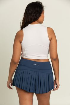 Smoke Sleeveless Crop Top is everything you'll want in a tank top & more. Made out of sweat-wicking, high-performance material, this tank features a high neck and corset lining detail for an extra pop. Pleated Tennis Skirt, Tennis Skirts, Athletic Top, Sleeveless Crop Top, Yoga Tops, Tennis Skirt, Bra Tops, High Performance, Daily Wear