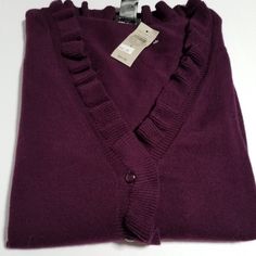 Large Ann Taylor** Cardigan Sweater In The Color Of Eggplant ... 1st Picture Is The Best One For Color. Ruffle Around The V Neck, Down The Front Where The Buttons Are. Long Sleeves. Chest 20.25" Back Length Not Including The Ruffle 22" Flat Lay Measurements Approx Non Smoking/Pet Friendly Home Elegant Purple Winter Cardigan, V-neck Ruffled Cardigan For Layering, Elegant Purple Fall Cardigan, V-neck Ruffled Winter Cardigan, Ruffled V-neck Cardigan For Layering, Ruffled V-neck Layering Cardigan, Taylor Cardigan, Eggplant, Cardigan Sweater