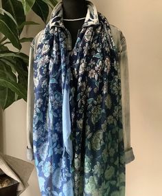 ❤️ This stunning handmade fall/summer scarf is the perfect accessory! All of our fall/summer scarves are 100% polyester which makes them lightweight, fade resistant, washable and soft. Drapes beautifully. Corners have cute tassels. These are large at approximately 38 inches x 72 inches.  ❤ Each piece is packaged with kindness and ready for gift-giving or just for your own beautiful self! ❤    ❤ ABOUT BB: We are an inspirational and fun loving mother-daughter team that started up a business with having a passion for jewelry and accessories just over a year ago.   We create jewelry and accessories that we love and inspires us to new heights. The items we design are made in the heart of Toronto, Ontario in the land of Canada, our home. Once the items are completed, we package them beautifully Bohemian Scarves With Floral Print, One Size, Bohemian Floral Print Scarves For Festivals, One Size Bohemian Scarves With Floral Print, One Size Bohemian Scarf With Floral Print, Bohemian One Size Floral Print Scarves, Bohemian One-size Floral Print Scarves, Summer Shawl Scarf With Floral Print, Bohemian Summer Scarves With Floral Print, Summer Bohemian Scarves With Floral Print