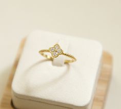 Introducing our CZ Diamond Clover Ring, a stunning piece crafted in gold vermeil, perfect for those seeking a touch of elegance. The intricate design features a charming clover band ring made from high-quality sterling silver 925, exuding both sophistication and style. This four leaf clover ring makes a delightful choice for engagements, anniversaries, or as a promise ring. Adorned with sparkling CZ diamonds, it adds a touch of glamour to any outfit. Embrace luck and beauty all in one with this exquisite clover ring - a true symbol of love and good fortune. size : 6 and 7 material:sterling silver 925, gold vermeil and CZ cubic zirconia comes with a gift box. View more jewelry HERE:  https://www.etsy.com/shop/DearMia?ref=listing-shop2-all-items-count#items Luxury Tarnish-resistant Diamond Ring As Gift, Cubic Zirconia Diamond Ring Gift, Cubic Zirconia Diamond Ring, Tarnish Resistant, Gift, White Gold Diamond Ring Gift, Tarnish Resistant, Luxury Yellow Gold Diamond Ring For Gift, Luxury Yellow Gold Diamond Ring As Gift, White Gold-plated Diamond Ring Gift, Yellow Gold Diamond Ring As Gift, Gold Plated Brilliant Cut Rings For Gift