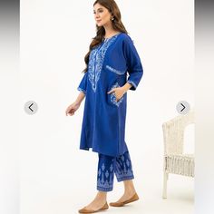 This Is Brand New Tagged Limelight Brand 2 Piece Outfit In Light Weight Khaddar This Is Beautiful In Real Life And Is Embroidered. Has Pockets Design Too. Selling Only Because Of Size Is Large And Comes With Pants Blue Straight Kurta Lawn Suit In Mulmul, Blue Mulmul Lawn Suit With Straight Kurta, Blue Long Sleeve Kurta In Mulmul, Blue Mulmul Kurta With Printed Motifs, Blue Long Sleeve Mulmul Kurta, Blue Mulmul Kurta With Dabka Detailing, Blue Kurta With Dabka In Mulmul, Blue Mulmul Lawn Suit With Printed Motifs, Blue Long Sleeve Mulmul Traditional Wear