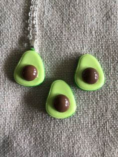 (19,752) Avocado Necklace and Earrings  Polymer Resin, 1" x 3/4" Earrings on stainless steel posts  Necklace on 16" silver plate chain with 2" extender Silver Resin Pendant Jewelry, Nickel-free Silver Resin Jewelry, Nickel-free Resin Pendant Jewelry, Nickel-free Resin Round Pendant Jewelry, Avocado Necklace, 4 Earrings, Earrings Polymer, Necklace And Earrings, Favorite Jewelry