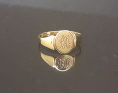 9 Carat solid hallmarked gold signet ring  Size UK Q 1/2 USA 8 1/2 Weighs 1.4 g Has PHG inscribed on the front Made in Birmingham England Band width 2 mm Head 10 mm high Please see image 6 for accurate size Please check Etsy address and ring size prior to order thanks Unfortunately I cannot resize rings but your local jeweller will be able to Will be sent free delivery signed/tracked  I post Tuesdays and Fridays R91 Classic Wedding Signet Ring With Name, Formal Yellow Gold Engraved Ring With Name, Formal Yellow Gold Engraved Name Ring, Gold Signet Ring With Hallmarks For Formal Occasions, Classic Signet Ring With Name For Anniversary, Classic Name Signet Ring For Anniversary, Gold Engraved Name Ring For Formal Occasions, Gold Engraved Ring With Name For Formal Occasions, Classic 14k Gold Signet Ring With Name