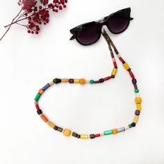 This wooden beaded strap is perfect accessory for the summer!  You can us it as a sunglasses strap or  necklace 2 in 1  You can wear also as a necklace. Just put 2 clasps together!   Length: 80 cm Boho Glasses, Unique Gifts For Boyfriend, Handmade Eyewear, Beaded Sunglasses, Eyeglass Strap, Beaded Strap, Glasses Chains, Mask Strap, Sunglasses Strap