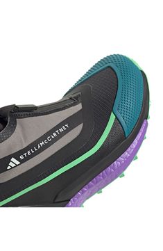 Step into a trail-ready hiking shoe with a partially recycled design. Enjoy enhanced comfort, a Gore-Tex® shield and a snug fit. This sneaker is perfect for hikers who crave top-notch performance. 3 1/2" heel ( size 8.5) 4" shaft Gore-Tex waterproofing provides all-condition dryness removable insoles Textile and synthetic upper/textile lining/synthetic sole Imported Dynamic Trail Running Shoes With Reflective Details, Green Trail Running Shoes With Boost Midsole For Walking, Purple Breathable Running Shoes For Outdoor, Functional Green Trail Running Shoes For Outdoor, Functional Green Trail Running Shoes For Outdoor Activities, Outdoor Purple Breathable Running Shoes, Green Running Shoes With Abzorb Midsole For Outdoor, Green Athleisure Trail Running Shoes For Outdoor, Sporty Purple Trail Running Shoes With Boost Midsole