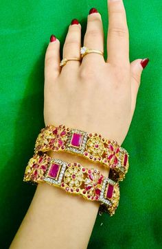 Beautifull indian gold pleated openable bangles set .size 2.6 Pink Cutdana Bracelets For Festivals, Festive Pink Cutdana Bracelets, Zari Work Bangle For Diwali Party, Gold Bangle With Zari Work For Party, Pink Cutdana Bangle For Diwali, Diwali Party Bangle With Zari Work, Traditional Pink Bangle For Festive Occasions, Traditional Pink Bangle For Festive Season, Pink Meenakari Wedding Bracelets