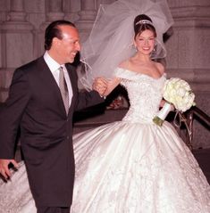 the bride and groom are walking down the stairs at their wedding ceremony in new york city