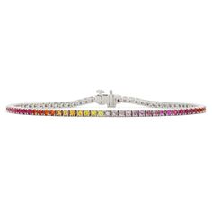 Experience color in the best way with our most coveted 14K gold tennis bracelet. 2.15Cts of semi-precious and precious stones are set in a stunning array that plays on color. Elegant Multicolor Brilliant Cut Gemstones, Classic Multicolor Diamond Jewelry, Multi-stone Diamond Tennis Bracelet, Diamond Multi-stone Tennis Bracelet, Round Diamond Multi-stone Tennis Bracelet, Elegant Multicolor Diamond Bracelet, Luxury Multi-stone Round Tennis Bracelet, Elegant Multicolor Tennis Bracelet For Formal Occasions, Classic Multicolor Bracelets For Formal Occasions