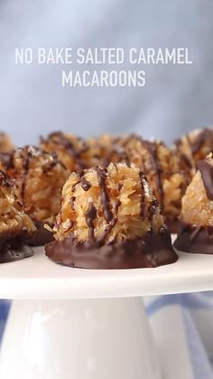 no bake salted caramel macaroons on a white plate with chocolate drizzle