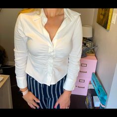 Only Worn Once! Basically Brand New Crisp White Zara Blouse Perfect To Dress Up For Work With Or To Make Casual For Brunch. Size Large But Runs A Bit Small Becausezara. I’m 5’10 And Typically Wear Size M Office Blouse With Button Closure And Stretch Fit, Stretch Blouse With Button Closure For Office, Stretch Office Blouse With Buttons, Elegant Stretch Button-up Top, Elegant Stretch Button-up Blouse, Fitted Button-up Office Lady Blouse, Fitted Button-up Blouse For Professional Wear, Elegant Stretch Blouse With Buttons, Trendy Fitted Tops For Office Wear