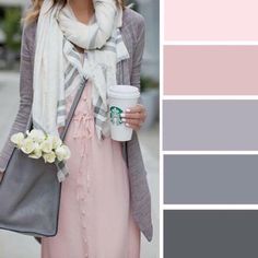 a woman in a pink dress holding a cup of coffee and a gray purse with white flowers on it