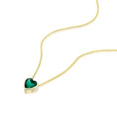 Express your love with the delicate beauty of this Emerald heart gold necklace. This stunning choker features a green gemstone pendant, in a solid gold 14K necklace, the perfect May birthstone jewelry. Product Details: ✤ Lab-grown Emerald, heart cut 6x6 mm ✤ 14K solid yellow/rose/white gold ✤ Packed in a luxurious gift box ✤ Fully Insured And Discreetly Packaged   Shipping: ✤ Free worldwide shipping. ✤ Shipped using FedEx/DHL were available, insured and trackable express shipping. ✤ Please add y Gold Heart-cut May Birthstone Necklaces, Green Emerald Heart Pendant Necklace, Gold Heart Cut Necklaces For May Birthstone, Gold Heart Cut Necklace For May Birthstone, Fine Jewelry May Birthstone Heart Cut Necklace, Green 14k Gold Heart Jewelry, Green Necklace With Heart Charm For Anniversary, Green Heart-shaped 14k Gold Jewelry, Green Heart Charm Necklace For Anniversary