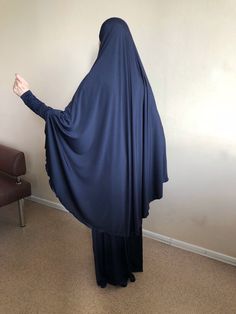 Unique maxi dress with khimar cape made by shiny jersey. Elegant abaya with a long sleeve, high cuff. The cuffs and hem dresses are decorated with lace. The warmth is slightly enlightened, so we sewed khimar cape lice a hijab for this dress! Free size Be feminine and beautiful, we are always happy to help you in your choice, you can write any questions in the message. We accept individual orders, this means that we can sew a dress of any size, style and color! Modest Blue Niqab For Eid, Blue Long Khimar For Eid, Long Blue Khimar For Eid, Blue Modest Khimar For Eid, Blue Modest Long Abaya, Modest Long Sleeve Solid Khimar, Modest Blue Maxi Length Abaya, Blue Long Sleeve Modest Khimar, Muslim Maxi Dress