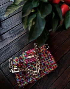 A beautiful beaded handbag made of multi-colored beads will complement your look. The handbag is very neatly made and roomy. Top lid with magnetic clasp. The handle of the handbag is removable. This model is SUITABLE: 🫶🏻 -flat - car key identifier - driver's license - headphones/AirPods - card owner - money lipstick - antiseptic Dimensions - Width: (18 cm) - Height: (12 cm) - Depth: (12 cm) - Handle height 40 cm PRODUCTION AND DELIVERY: All our products are handmade on request from the highest Trendy Multicolor Beaded Bags, Trendy Multicolor Beaded Shoulder Bag, Handmade Multicolor Rectangular Evening Bag, Multicolor Handmade Evening Bag For Everyday Use, Handmade Multicolor Handheld Evening Bag, Multicolor Handheld Evening Bag As Gift, Multicolor Handheld Evening Bag For Gift, Multicolor Beaded Evening Bag, Multicolor Beaded Rectangular Evening Bag