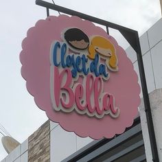 a close up of a sign on the side of a building that says claverda pella