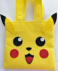 a yellow bag with a pikachu face on it