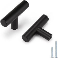 two black plastic knobs with screws on white background