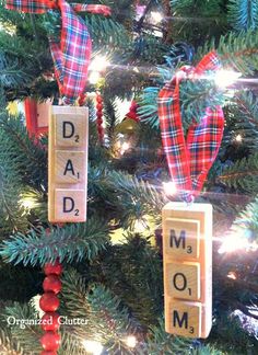 a christmas tree decorated with scrabble blocks that spell out dad's day