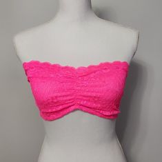 Brand New Without Tags Free People Neon Hot Pink Essential Lace Bandeau Bra Lace Bandeau With Scalloped Lace Along The Bust. Criss Cross Stretchy Straps That Loop Together In Back. Lined. Shop With Confidence 5 Seller Top 10% Seller Posh Ambassador Ii Posh Affiliate 18 X Posh Party Co-Host 2x Posh Live Panel Speaker Certified Closet Consultant Smoke Free Home Super Fast Shipper Summer Lace Bandeau Crop Top, Stretch Lace Strapless Tube Top, Pink Fitted Strapless Bra, Spring Bandeau Lace Crop Top, Stretch Lace Bandeau Tube Top, Summer Strapless Lace Bra, Lace Bandeau Tube Top With Built-in Bra, Spring Lace Bandeau Crop Top, Lace Tube Top With Built-in Bra For Summer