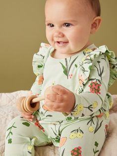 Let's hear it for one-and-done dressing! So stylish and sweet, this long sleeve romper has a cute keyhole back detail, convenient inseam snaps, and adorbs shoulder ruffles. The gorgeous floral print is from our Sweden collection. Matching family styles are available in our Sibling Shop. Visit our Global Shop to see more of our favorite styles from around the world. Playful Long Sleeve Jumpsuits And Rompers For Playtime, Playful Long Sleeve Bubble Romper For Loungewear, Playful Long-sleeve Bubble Romper For Loungewear, Spring Long Sleeve Bubble Romper For Playtime, Spring Playtime Long Sleeve Bubble Romper, Spring Playtime Bubble Romper With Long Sleeves, Playful Long Sleeve Bubble Romper, Cute Long Sleeve Bubble Romper For Spring, Playful Long Sleeve Spring Bodysuit