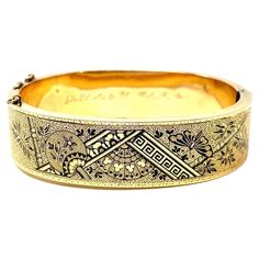 In 19th century New Orleans, jewelers produced exquisite jewelry in gold with delicate French enamel decoration. The bracelets were usually sold in pairs- and featured a different design on each side. Today they are usually found singly. This lovely bangle is engraved inside with two dedications: "ALP to MFP 1893", and "MFP to MEP 9-6-30", giving it a charming story to tell. 5/8" wide, inside measurement 6 1/2" Old New Orleans, Gold Enamel, Exquisite Jewelry, Old And New, New Orleans, 19th Century, Bangle Bracelets, Jewelry Bracelets, Bangles