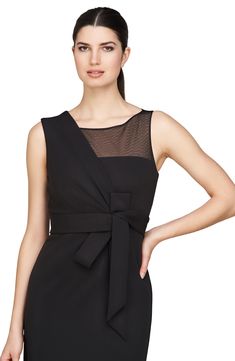 A mesh inset adds to the alluring angle animating the gorgeous geometry defining this dress. 54" length Hidden back-zip closure Asymmetric neck Sleeveless Lined 95% polyester, 5% spandex Dry clean Imported