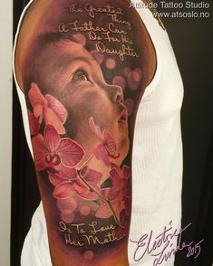 a man with a tattoo on his arm has orchids and a horse's face