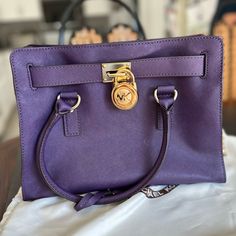 Brand New In Perfect Condition. Unused. Please Look At Photos For Measurements. Comes With Dust Bag In Photo. Bag Has Handles And Shoulder Strap With Gold Toned Chain Accents Michael Kors Purple Bags For Everyday Use, Michael Kors Purple Everyday Bags, Travel Bag With Purple Color And Gold-tone Hardware, Elegant Purple Bags With Gold-tone Hardware, Purple Shoulder Bag With Gold-tone Hardware For Everyday Use, Purple Travel Bag With Gold-tone Hardware, Purple Top Handle Shoulder Bag With Gold-tone Hardware, Designer Purple Bags With Gold-tone Hardware, Designer Purple Bag With Gold-tone Hardware