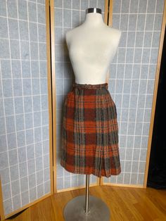 "1950's orange plaid tweed pencil skirt with belt. Metal zipper up the side and button closure. Good vintage condition Women's small 25\" or snug 26\" waist 39\" hips 24\" waist to hem" Sparkly Halter Top, Skirt With Belt, Vintage Gloves, Tweed Pencil Skirt, Orange Plaid, House Dress, White Gloves, Metal Zipper, Belt Size