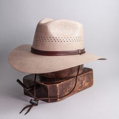 Description This Mens Wide Brim Straw Sun Hat - Barcelona is stylish, clean and cool natural quality with a front pinch, teardrop creased crown combines UPF 50+ sun hat protection with a mens wide diamond shaped side cut outs for 360° ventilation airflow on hot summer days. Trimmed brim & stamped leather style hat band, nylon stampede string with under chin fastener. Straw sun hat for the beach, boat, patio, pool, garden or golf course. Colors: tan, cream and natural 3.5” extra wide brim slopes Panama Hat Style, Mens Beach Hats, Construction Hat, American Hat Makers, American Hat, Straw Fedora Hat, Mens Sun Hats, Hat Stores, Straw Sun Hat