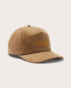 Inspired by the decades and designed to capture timeless style, the Wesley unstructured 5 Panel features a medium curved brim and medium crown profile. This classic shape and fit is a go to staple and will never disappoint. 100% cotton corduroy Snap closure 2.6" in brim length Hand wash, dry flat Store on a flat surface in a cool, dry place away from direct sunlight Classic Brown Baseball Cap With Flat Brim, Classic Brown Flat Brim Baseball Cap, Classic Brown Baseball Cap With Curved Brim, Vintage Adjustable Dad Hat With Short Brim, Classic Adjustable Trucker Hat With Curved Brim, Classic Snapback Summer Hats, Classic Snapback Hat With Curved Brim, Classic Baseball Cap With Short Brim, Classic Brown Hat For Streetwear