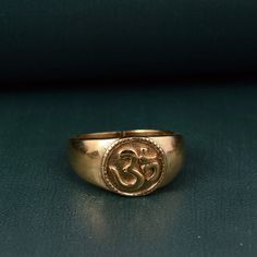 Om Ring, Signet Ring, Ohm Ring, Designer Brass Ring, Vintage Ring, Dainty Ring, Handmade Ring, Meditation Ring, Religious Ring, Yoga Ring Size:- All Size Available In Variation Metal:- Brass ❥ Customers satisfaction is our biggest priority, please contact us with any questions/queries for future or existing orders, and we will do our best to make sure you are happy with your order. ❥Please make sure to add the correct address during check out. You can return your purchased item within 15 days af Spiritual Brass Open Ring, Symbolic Open Promise Ring, Spiritual Brass Engraved Ring For Anniversary, Brass Spiritual Promise Ring, Spiritual Brass Promise Ring, Adjustable Engraved Spiritual Ring, Brass Rings Gift With Round Band, Handmade Symbolic Toe Rings, Spiritual Hallmarked Open Ring