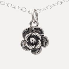 "Uncover the sublime elegance of our 925 Sterling Silver Rose Flower Pendant Necklace. The necklace features a meticulously crafted pendant with a design inspired by the timeless beauty of a blooming rose. Measuring 0.39\"x0.39\" (10x10mm), this small but impactful pendant exudes understated luxury, promising to bring a touch of sophistication to any outfit. Its fine detailing and high-quality material reflect our commitment to craftsmanship, ensuring that you get a jewelry piece that is both du Elegant Rose Flower Pendant Charm Necklaces, Delicate Silver Charm Necklace With Flower, Silver Adjustable Flower Charm Necklace, Adjustable Silver Flower Charm Necklace, Silver Adjustable Flower Charm Necklaces, Adjustable Silver Flower Charm Necklaces, Dainty Silver Rose Design Necklaces, Dainty Silver Necklaces With Rose Design, Silver Dainty Necklace With Rose Design