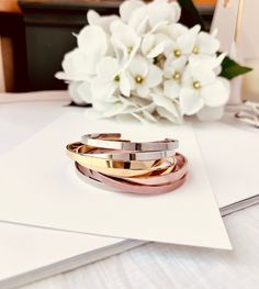 This cuff bracelet is perfect for stacking and everyday wear.This listing is only for a single bracelet.Adjustable bangle. ONE size. fit any size wrist from 6"- 7.5" Width - 4mm.16K Gold- plated • Silver-plated • Rose gold plated - Not easily tarnished. C A R E | T I P SAll pieces are protected with an anti-tarnish barrier. In order to maximize the life of your handmade jewelry, we suggest following the below care instructions:We don’t want your special moment to fade. To maintain the quality of Adjustable Modern Rose Gold Bangle, Rose Gold Stackable Bangle Bracelet, Modern Adjustable Rose Gold Bracelets, Adjustable Rose Gold Cuff Bracelet, Modern Rose Gold Cuff Bangle Bracelet, Trendy Rose Gold Metal Cuff Bracelet, Adjustable Rose Gold Bangle As Gift, Adjustable Rose Gold Bangle For Gift, Rose Gold Stackable Cuff Bracelet For Everyday