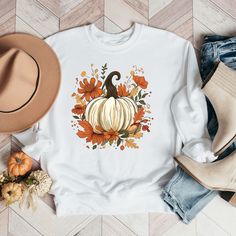 Looking for a cute versatile top to wear this summer? Make sure to grab one of our Fall Pumpkin Floral Sweatshirts! This soft and comfortable shirt is the perfect top for any outfit. It can be paired with biker shorts, Jeans, or the classic stay at home sweats! The bright color adds a pop of summer to any outfit. This sweatshirt is true-to-size, so be sure to order your regular size! If you are looking for a more oversized look, make sure to size up. Red H, Floral Sweatshirt, Color Dust, Gildan Sweatshirts, Fall Sweatshirt, Shorts Jeans, Carolina Blue, Blue Ink, White Ink