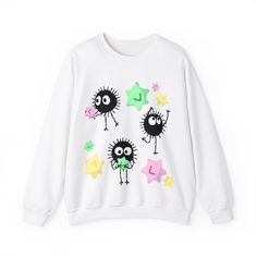 Introducing our enchanting Soot Sprite Crew Neck Sweatshirt, inspired by the iconic spirits from Studio Ghibli's "My Neighbor Totoro." This cozy sweatshirt features adorable Soot Sprites playfully scattered across a soft, comfortable fabric. Perfect for cooler days and lounging in style, it blends whimsical charm with everyday comfort. Embrace the magic of Studio Ghibli with this must-have addition to your wardrobe, ideal for fans of all ages who appreciate a touch of fantastical flair in their Studio Ghibli Sweatshirt, Studio Ghibli Shirt, Soot Sprite, Soot Sprites, Neighbor Totoro, My Neighbor Totoro, Cozy Sweatshirts, Studio Ghibli, Cut And Style