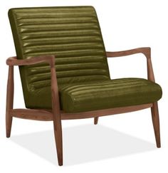 a green leather chair with wooden legs and armrests on an isolated white background