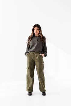 Features High rise Cargo pants Straight leg Stretchy waist Pull on pants 97% Cotton 3% Spandex Size + Fit Small 2-4, Medium 6-8, Large 10-12 Jacquelyn is 5'4" and is wearing a size small Small 2-4, Medium 6-8, Large 10/ 12, X-Large 14-16 True to size. Do have stretch, but do not lose shape. Waist measurements are taken while laying flat and doubled. Size Waist Rise Inseam Small 24" 12" 28.50" Medium 26" 13" 29.50" Large 28" 13" 30.50" Stretch Bottoms With Pockets For Fall, Fall Utility High Waist Pants, Fall Cargo Pants With Elastic Waistband And Relaxed Fit, High Waist Utility Pants For Fall, Fall High Waist Utility Pants, Fall High-waist Utility Pants, Winter Straight Leg Bottoms With Pockets, Utility Cargo Pants Full Length For Fall, Straight Leg Winter Bottoms With Pockets